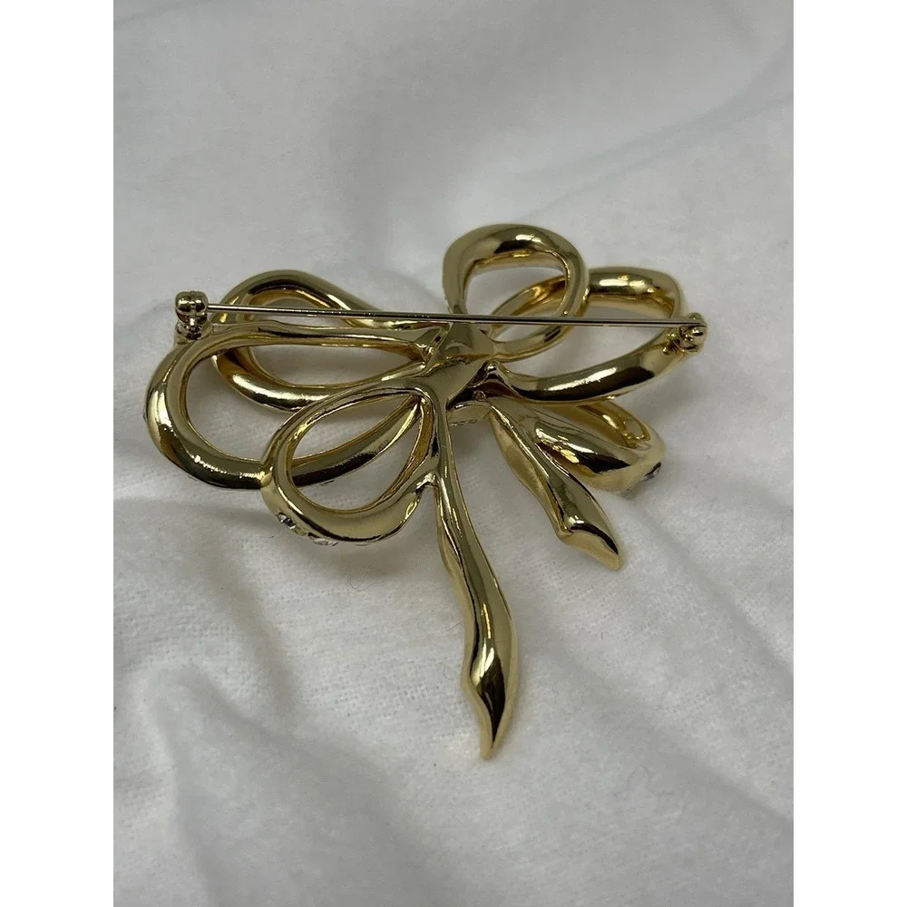 Vintage KJL For Avon Bow Pin Brooch Crystal Gold Tone Kenneth Jay Lane 2 3/4 In.